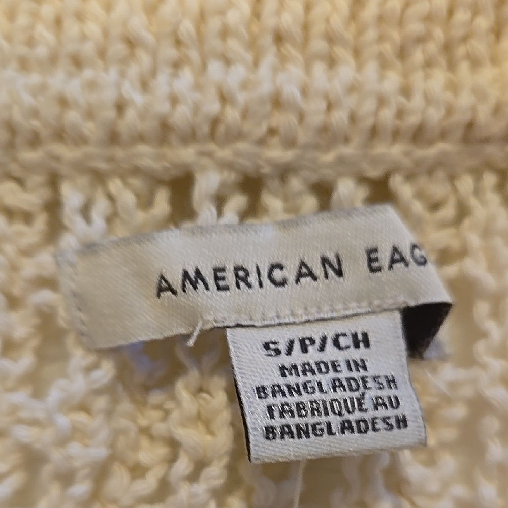 B78. New American Eagle Outfitters Cream Polo Lace Up Knit Sweater Size Small - Picture 2 of 6
